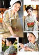 A woman in a kimono is posing for a picture.